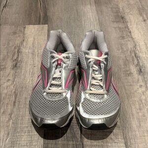 Women’s Silver and Pink Reebok Runtone, no insole included.